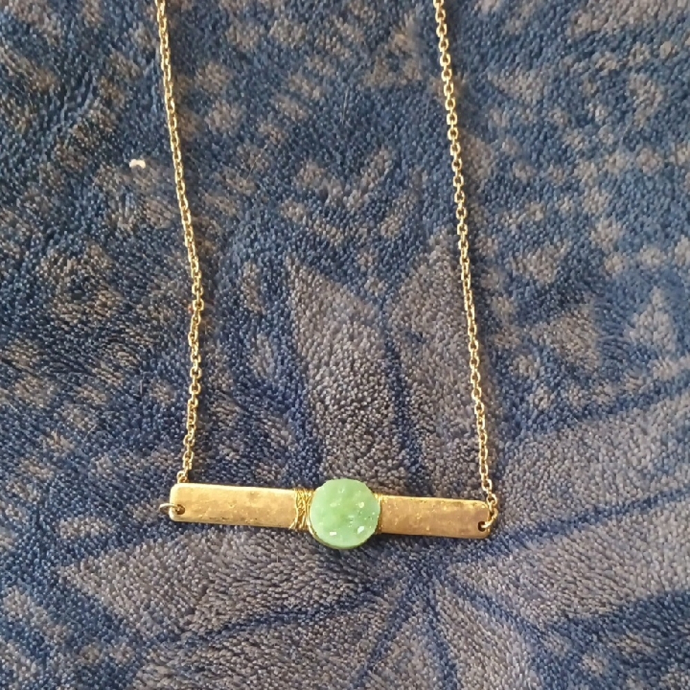 Elegant Gold Necklace with Green Stone